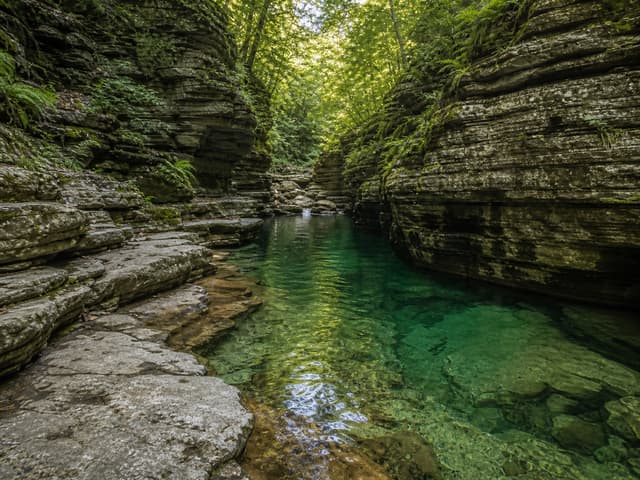 Editorial image of a black-rock coastal freshwater pool
