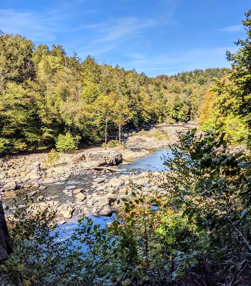 Autumn view over the rocky Middle Fork River channel at Audra State Park