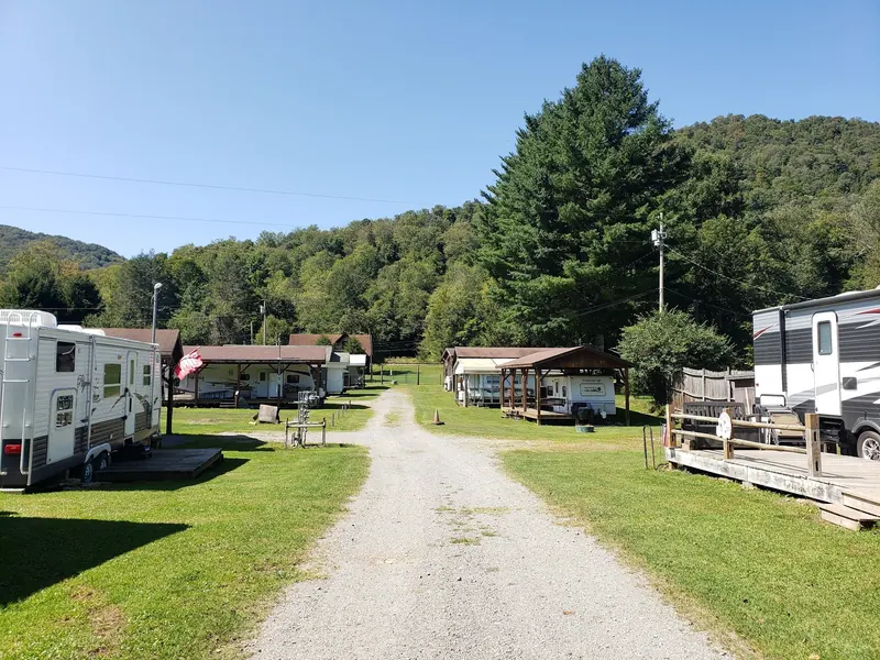 Gravel lane between RV campsites at Bemis Campground, a separate accommodation near the river