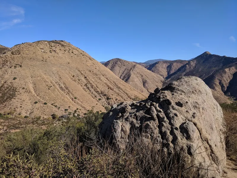 Dry canyon slopes and boulders along the Cedar Creek Falls hiking area