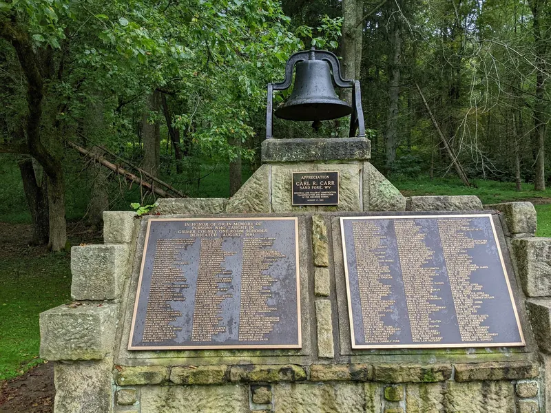 Bell and Gilmer County one-room-school memorial plaques from the Cedar Creek State Park photo collection; historical park context, not water access
