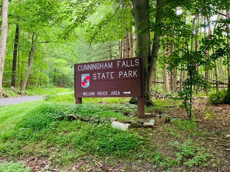 Roadside sign directing visitors to the William Houck Area of Cunningham Falls State Park