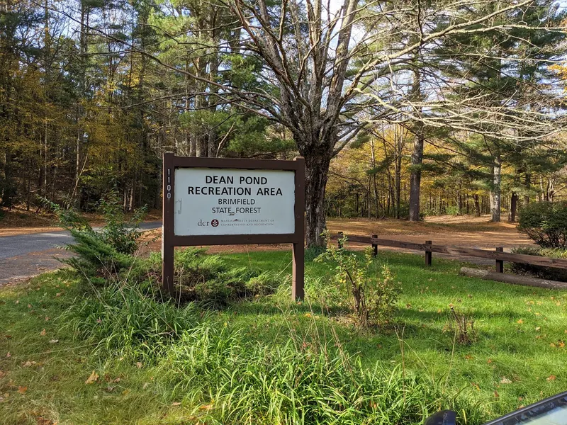 Dean Pond Recreation Area sign identifying Brimfield State Forest; current access must be checked with DCR