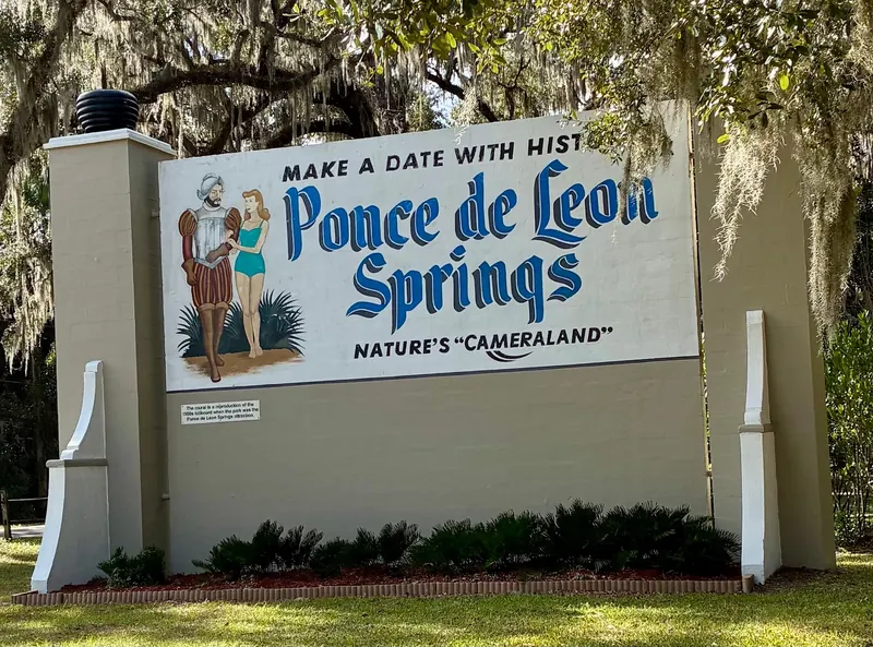 Ponce de Leon Springs attraction mural beneath moss-draped trees in the De Leon Springs State Park collection; historical park context