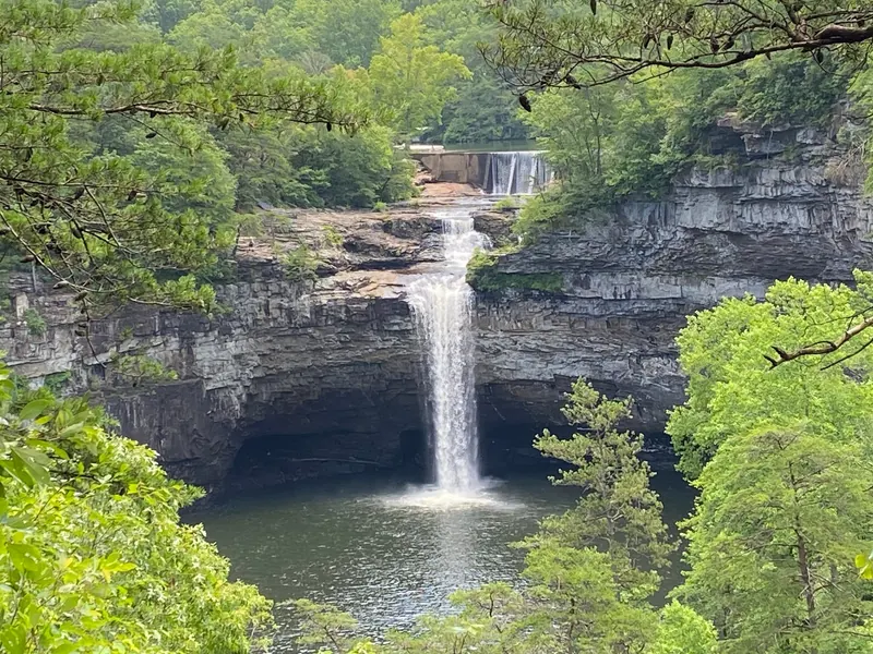 DeSoto Falls dropping into a wooded gorge below the upstream dam