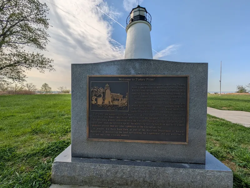 Turkey Point Lighthouse and its interpretive plaque, a separate Elk Neck park destination from North East Beach