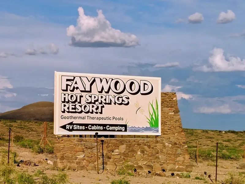Faywood Hot Springs Resort roadside sign against the New Mexico desert landscape