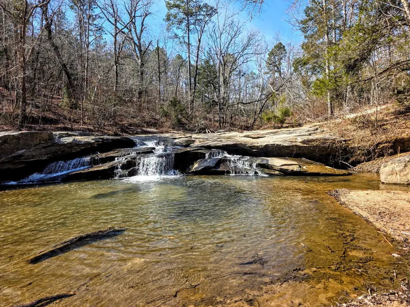 Water flowing across layered rock at Horseshoe Falls in South Carolina