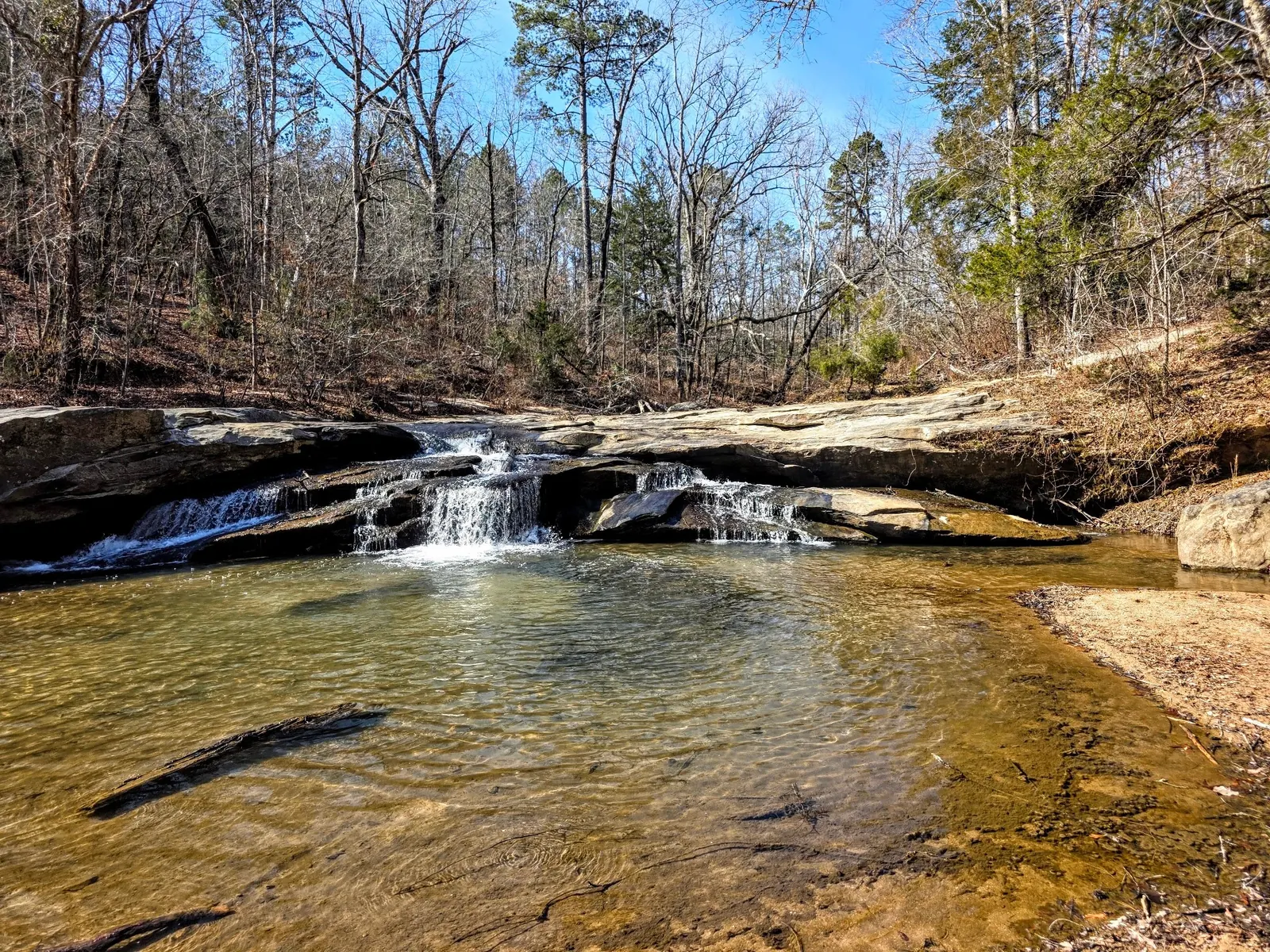 Water flowing across layered rock at Horseshoe Falls in South Carolina