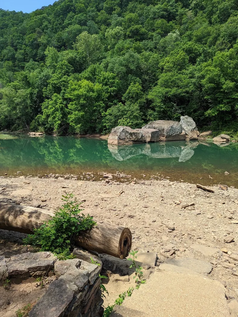 River pool beside large boulders and a gravel bank in the Long Pool Recreation Area photo collection; not a surveyed swimming entrance