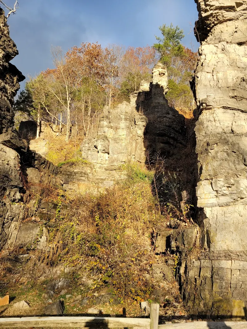 Sunlit rock formations and autumn vegetation at Natural Chimneys Park