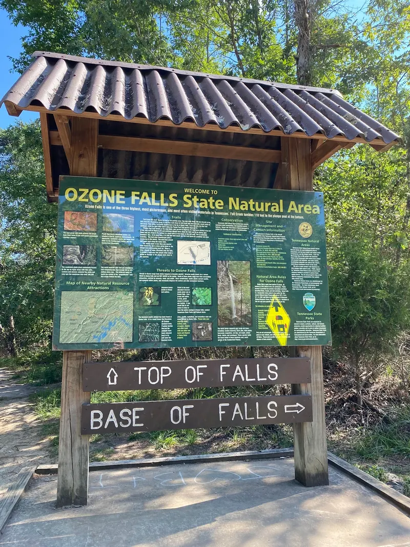 Ozone Falls State Natural Area information board with separate top and base trail signs