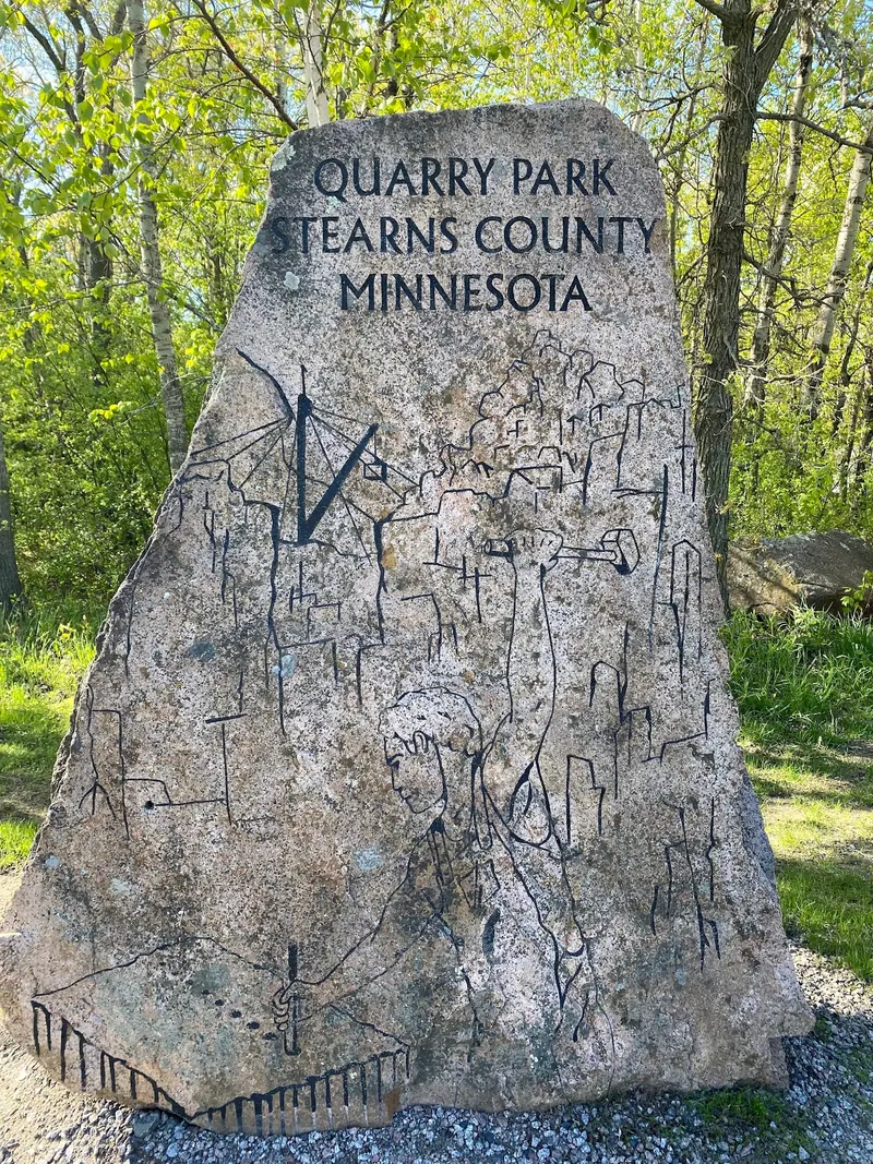 Engraved stone sign reading Quarry Park, Stearns County, Minnesota