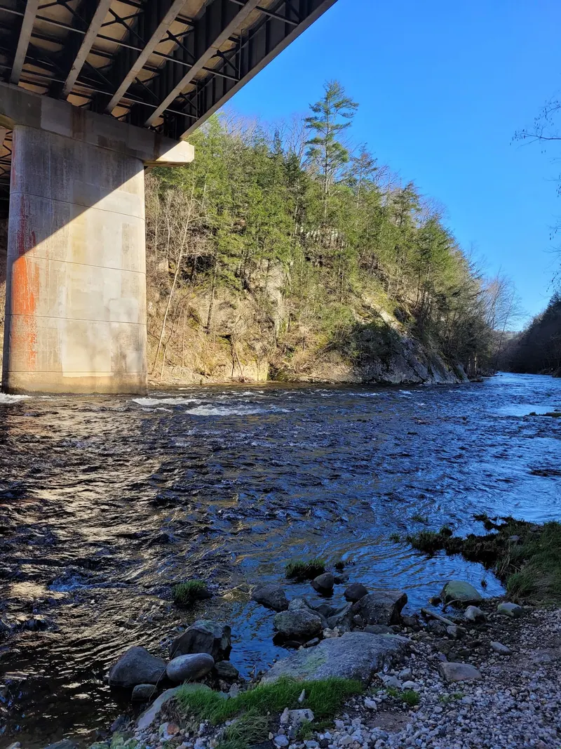 Rocky Farmington River gorge beneath a bridge in the Satan's Kingdom photo set