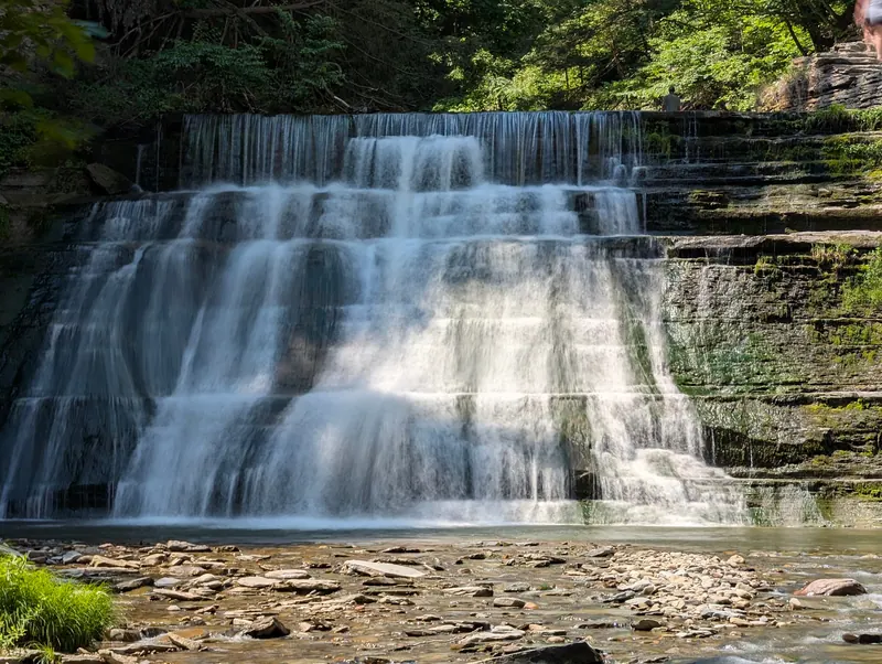 Cascade between layered rock walls in the Stony Brook State Park gorge