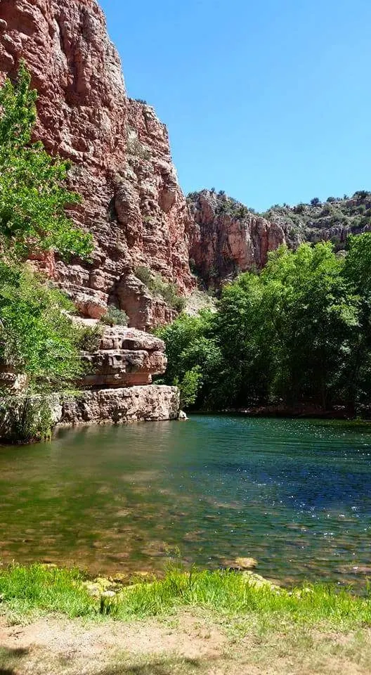 Creek pool below red cliffs in Sycamore Canyon; historical conditions