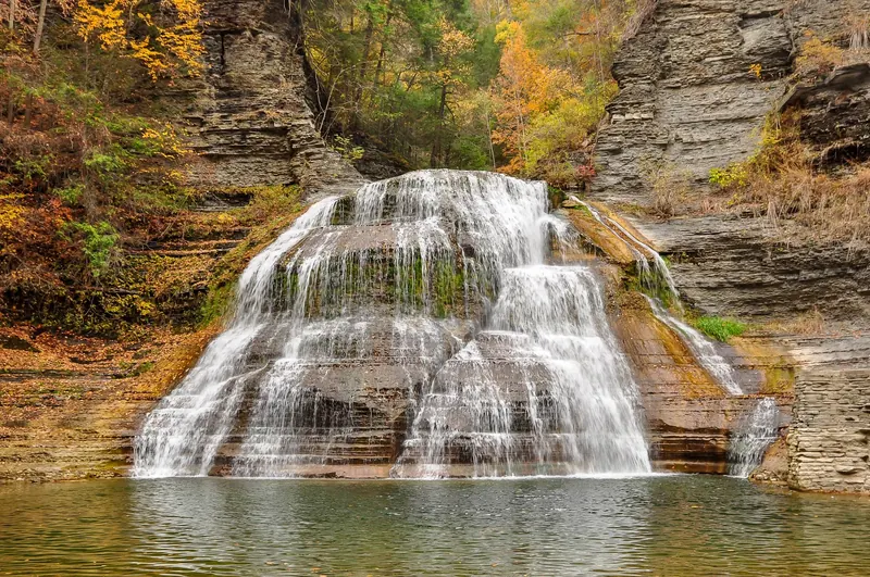 Lower Falls at Robert H. Treman State Park with autumn foliage and no swimmers